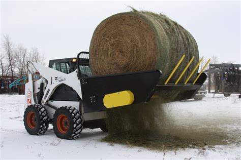 skid steer bale unroller|round bale unroller for rebaling.